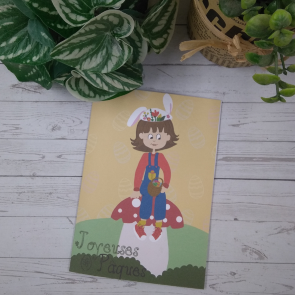 Carte de vœux illustration d’une scène représentant une petite fille, Chloé sur un champignon qui a récolté les œufs de pâques.